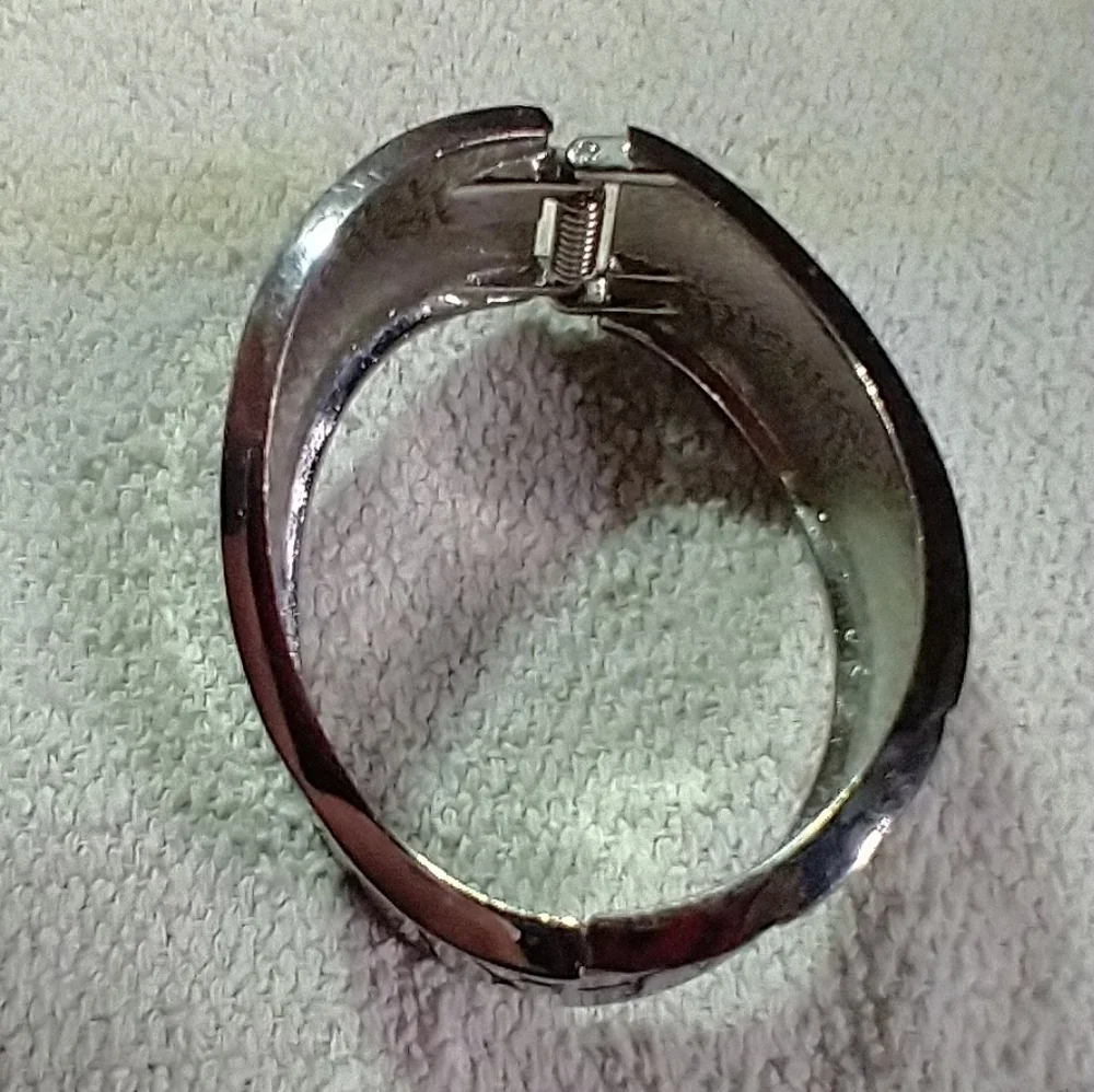 Silvertone wavy textured wide hinged bracelet